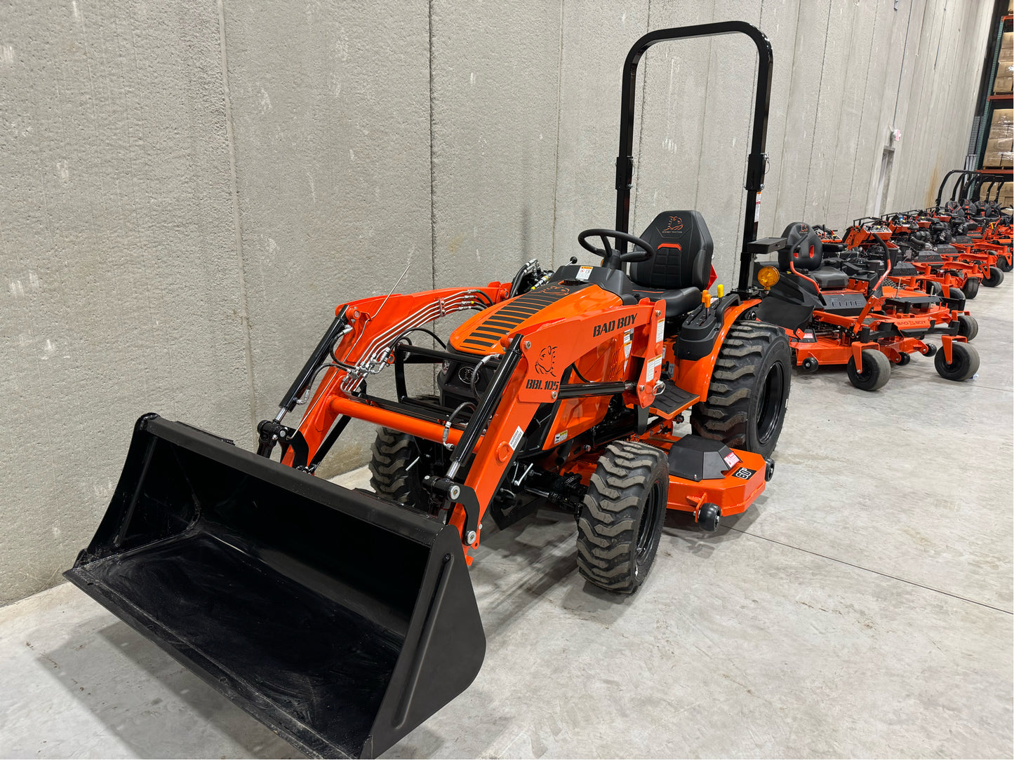 1025H - 10 SERIES, 24 HP W/ 105 LOADER & BELLY MOWER